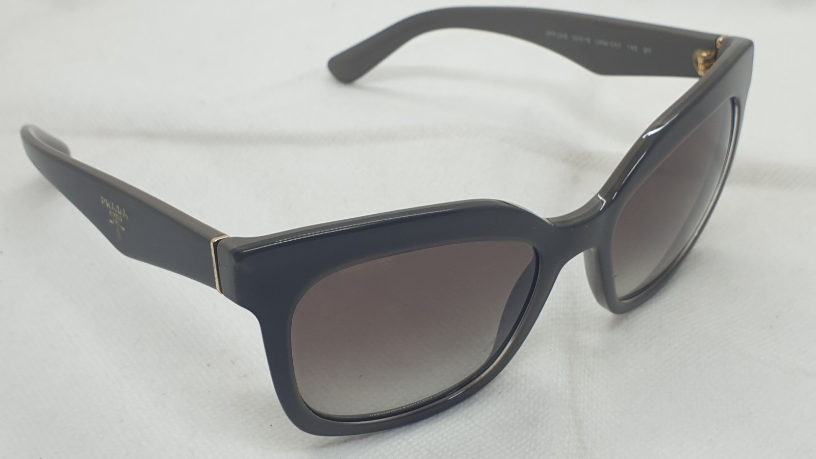 Prada SPR 24Q UAM-0A7 Sunglasses. Made in italy