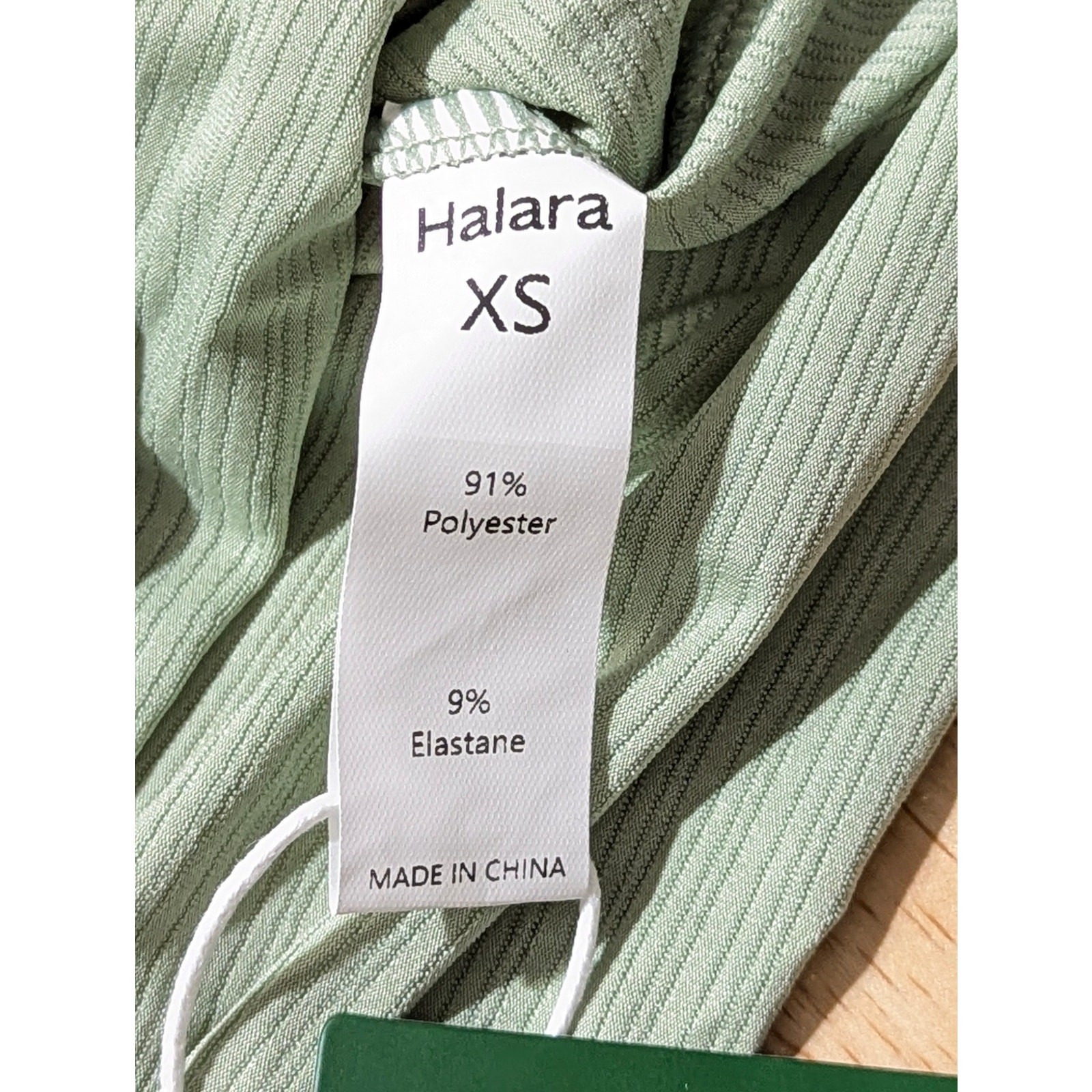 HALARA Sheer Jacquard Asymmetric Hem Top XS Quick Dry Workout NWT Light Green