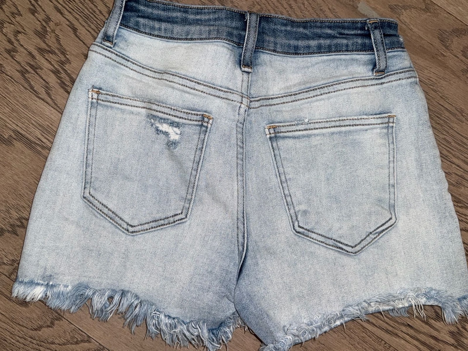 Ceros Two-Tone High Rise Raw Hem Denim Shorts