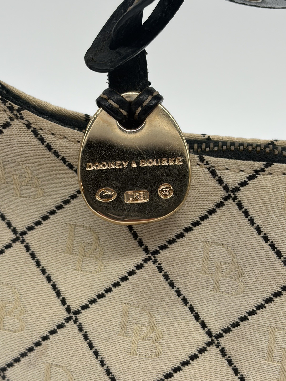 VTG Dooney & Bourke Cream Canvas Small Signature Hobo Shoulder Bucket Bag