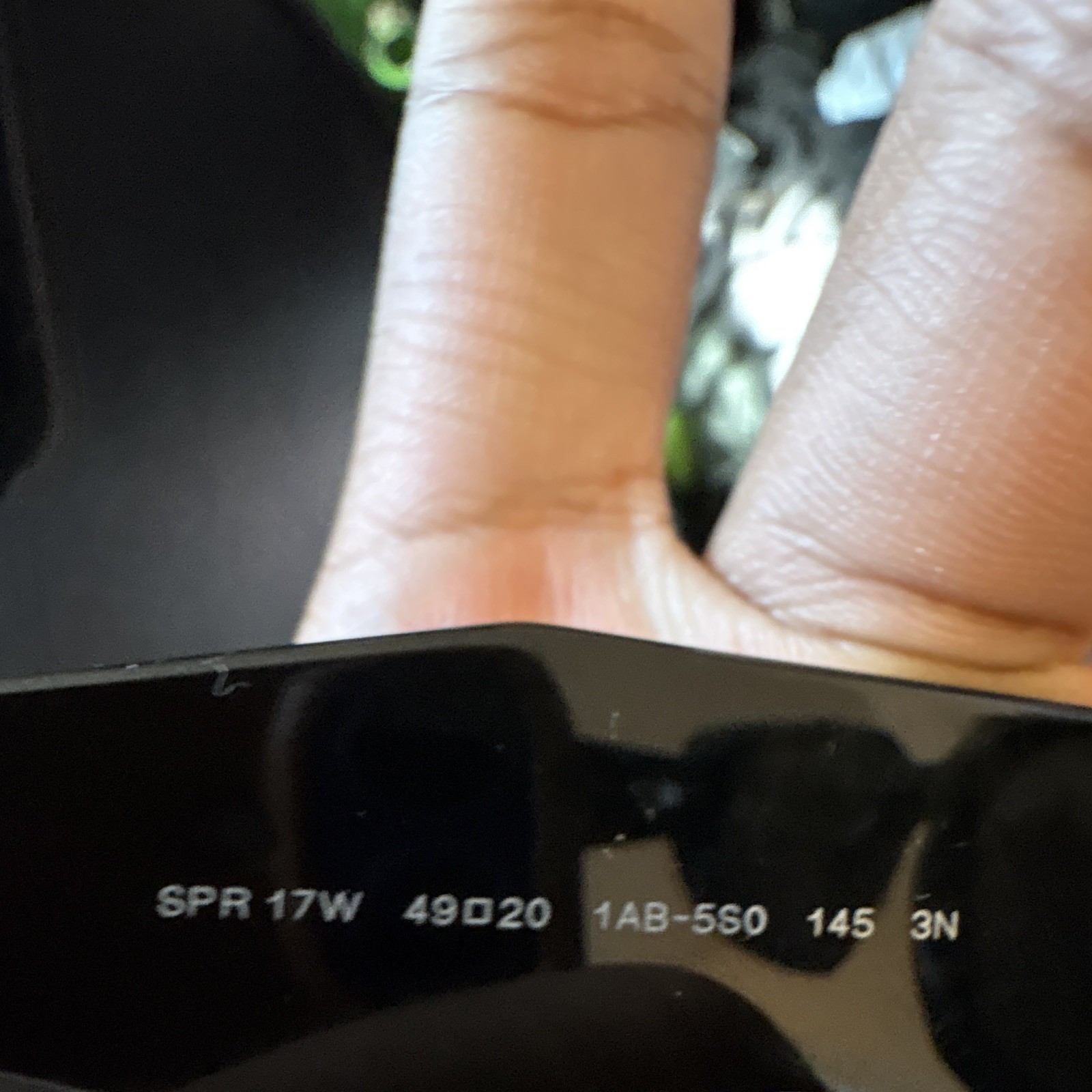 Prada SPR 17W Rectangle Sunglasses Black Frame/Black Lens Plastic 145mm