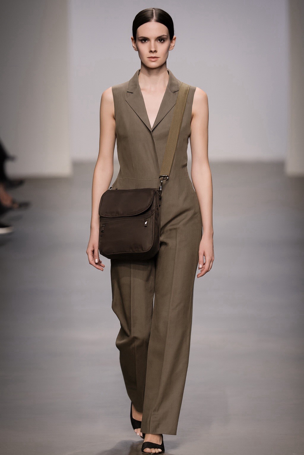 Brown Crossbody Bag with Adjustable Strap, Zipper Accents, and Front Pocket