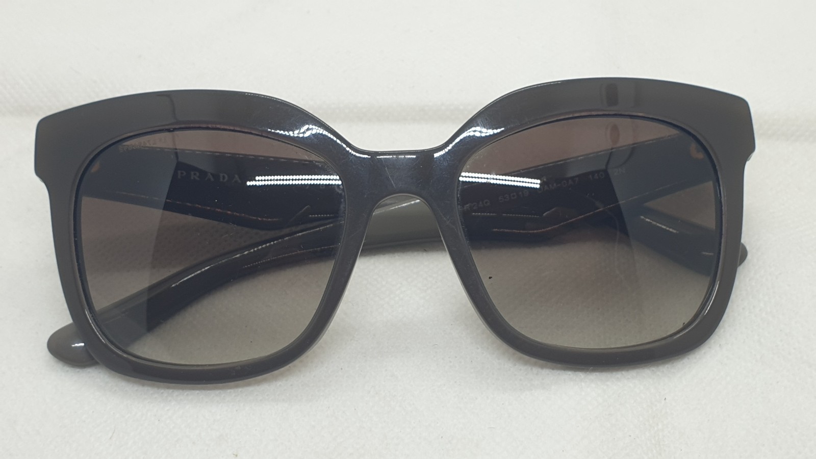 Prada SPR 24Q UAM-0A7 Sunglasses. Made in italy