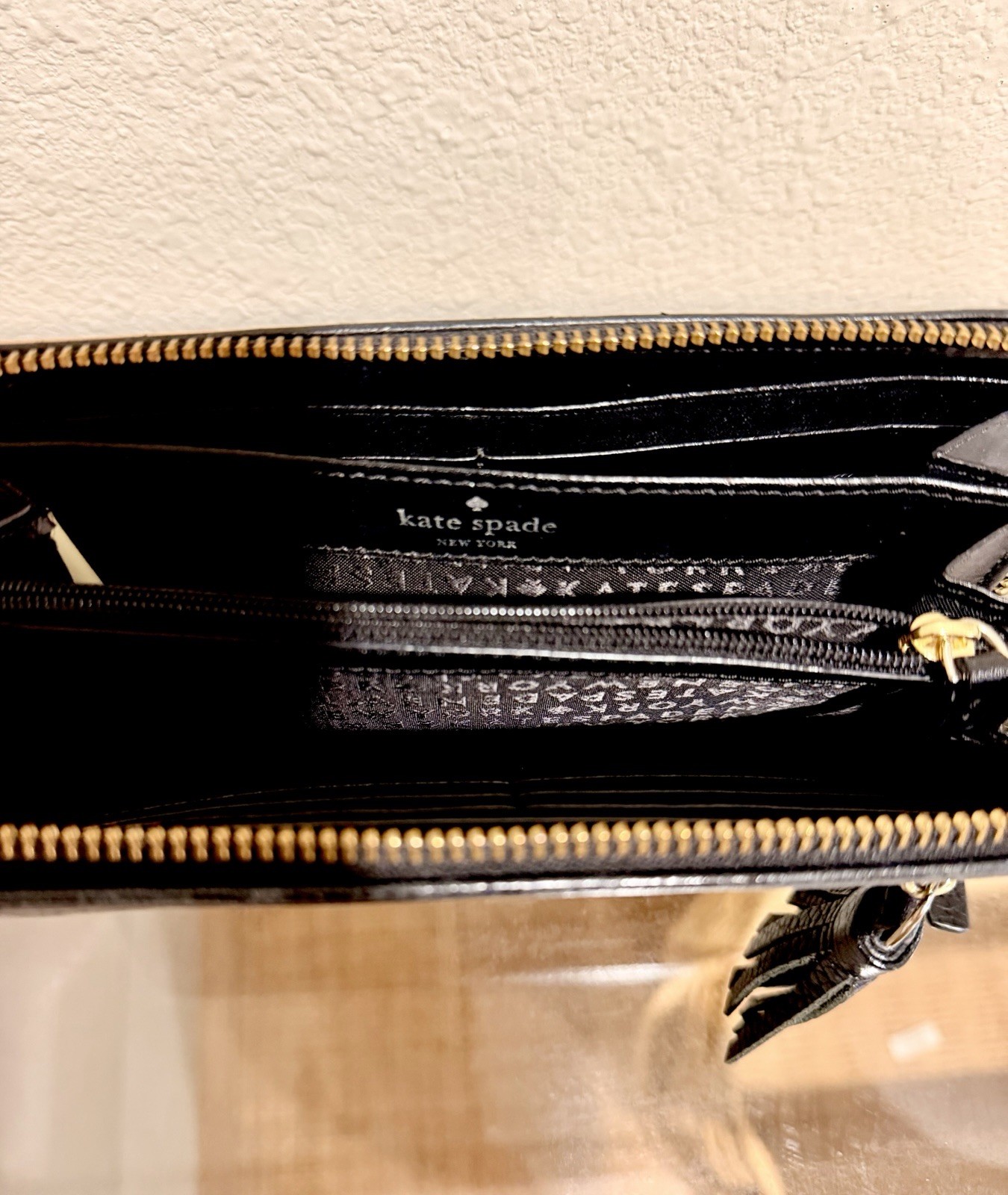 kate spade new york Black Zip-Around Wallet Tassel Logo Women’s Credit Card