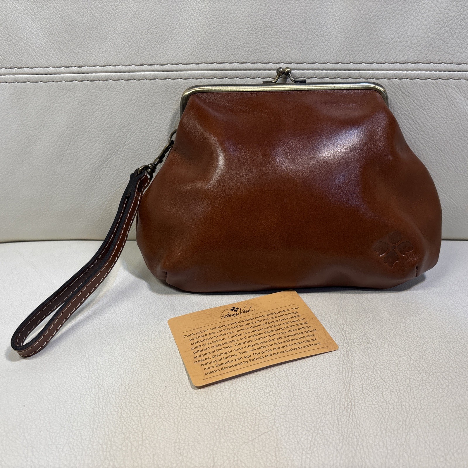 Patricia Nash Brown Framed Wristlet Wallet with Embossed Flower Logo EXCELLENT