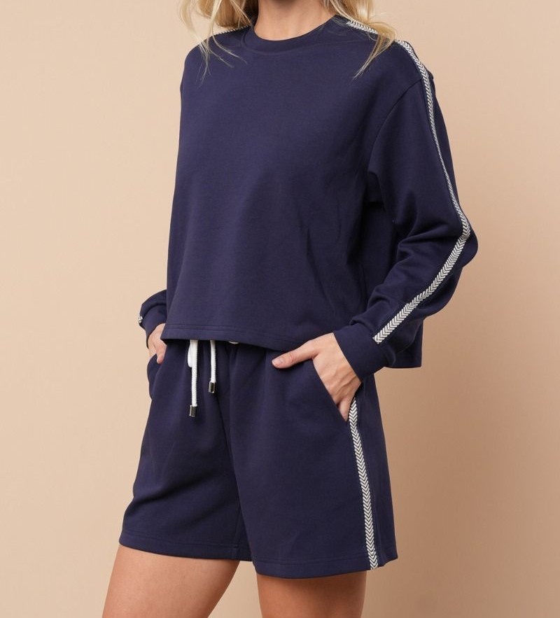 WHITE BIRCH Navy Scuba Fabric Top with Arrow Stitch Trim – M L
