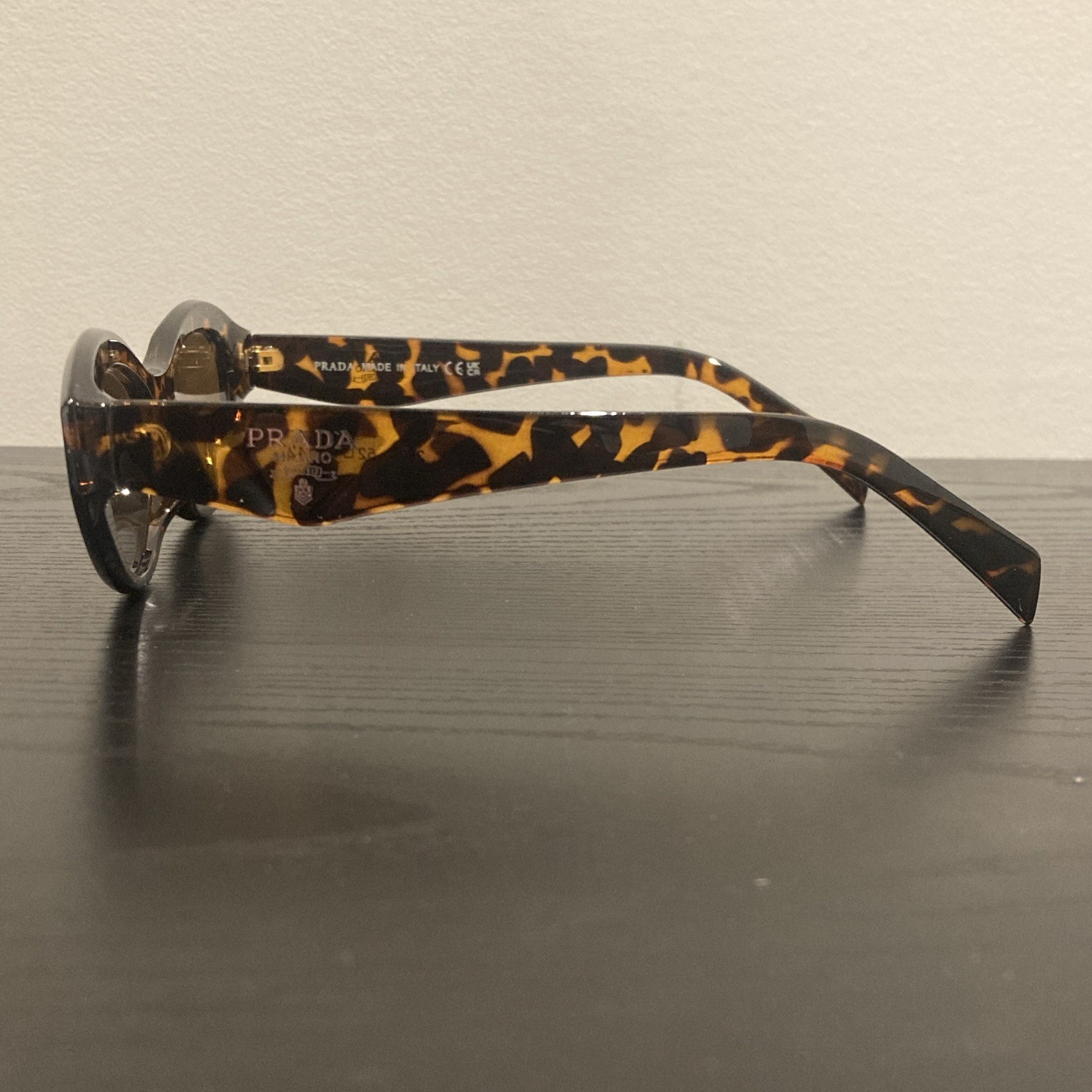 PRADA Women’s Tortoise Shell Oval Sunglasses Brown Plastic Tinted Lens