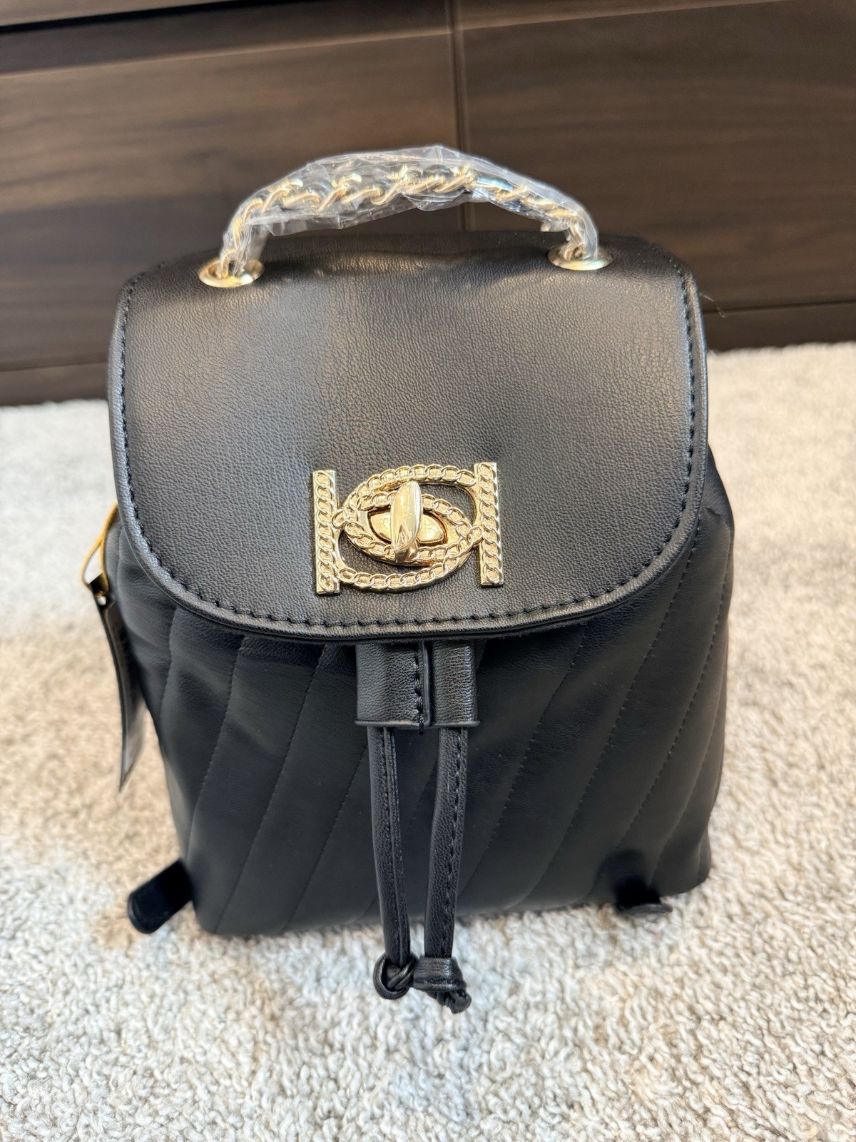 Bebe Black Backpack Drawstring Turn Lock Quilted Gold Hardware Adjustable Strap