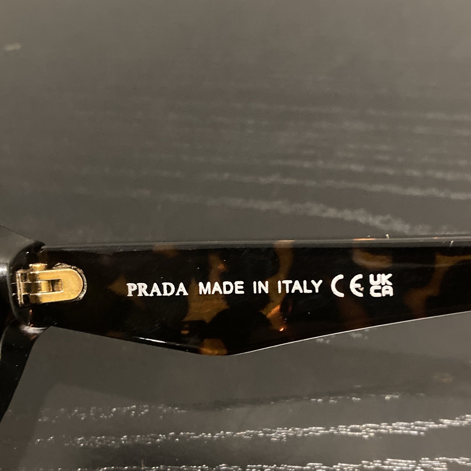 PRADA Women’s Tortoise Shell Oval Sunglasses Brown Plastic Tinted Lens