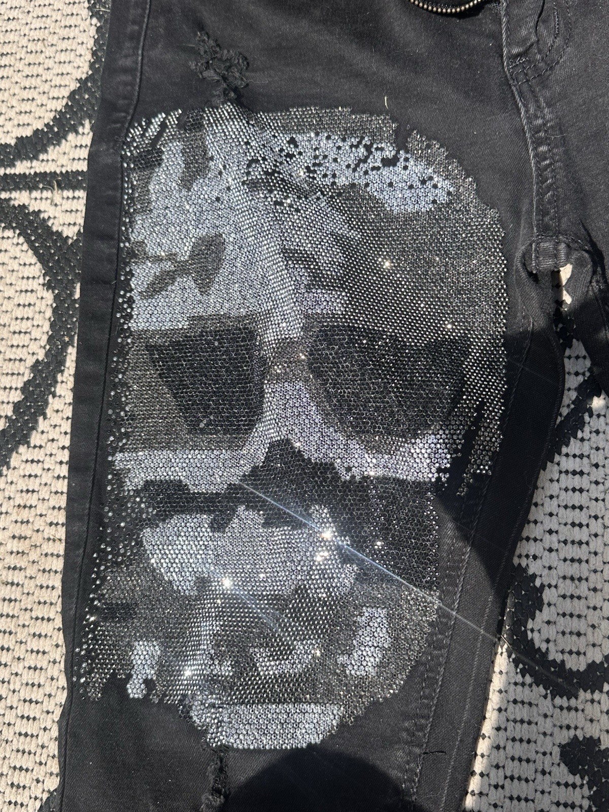 Waimea black skinny jeans with rhinestone skull. Size 32