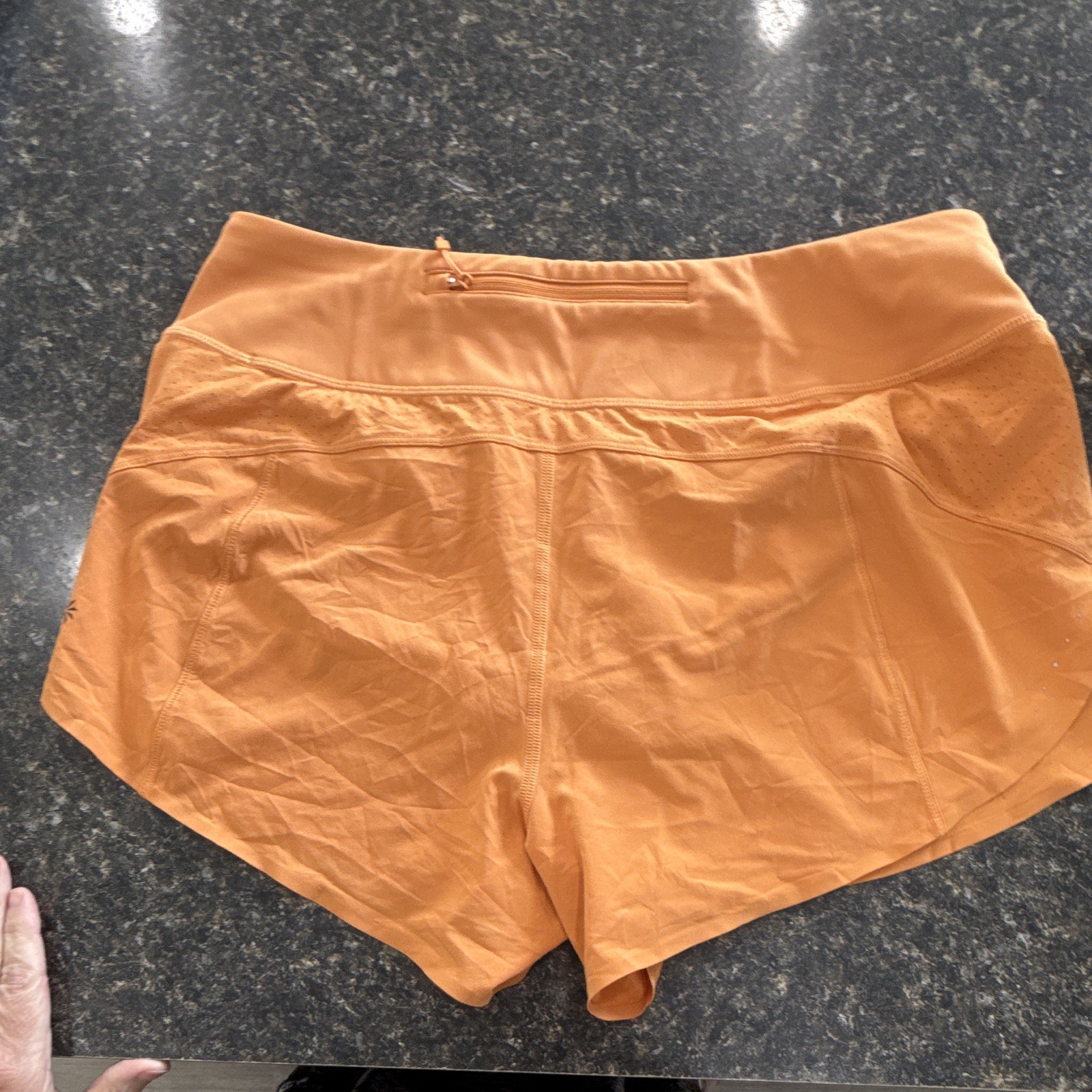 Athleta Women’s Run With It Orange 3.5in Running Shorts Zip Pockets Stretch