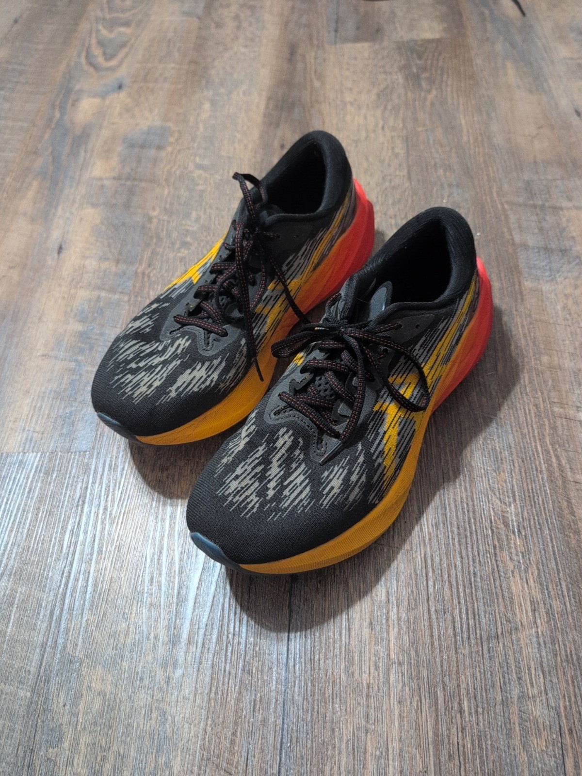 ASICS Novablast 3 Shoes Mens Size 11.5 Black Orange Running Athletic Sneakers