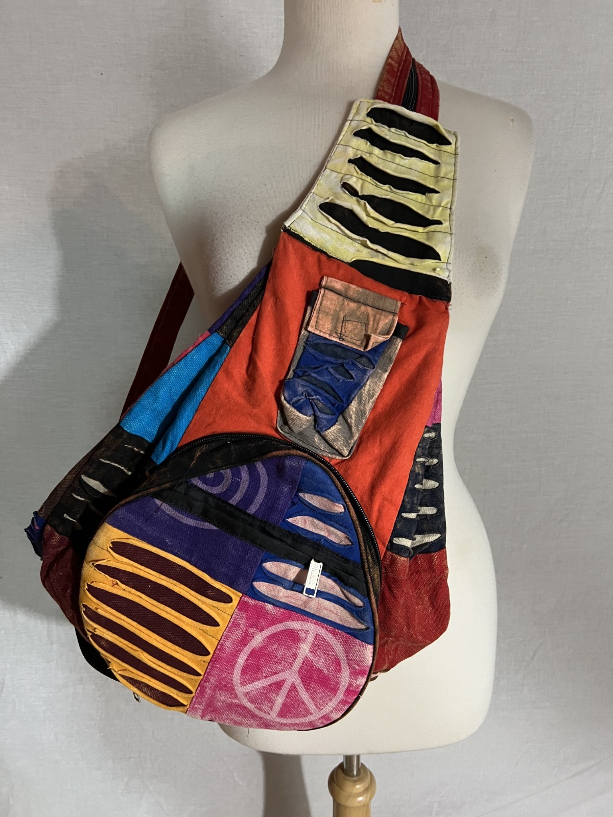 NWOT Patchwork Cotton Fold up Backpack Stonewash Multicolor Peace Sign ~15 x16″