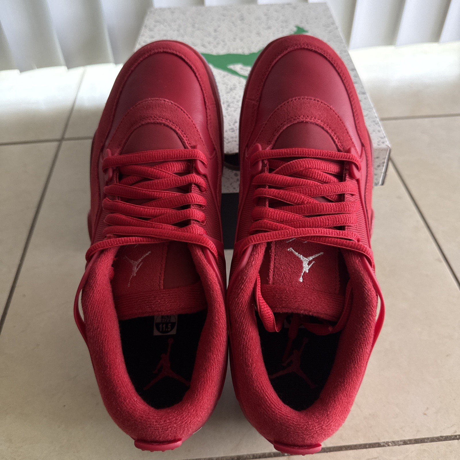 Size 11.5 – Air Jordan 4 RM Varsity Red