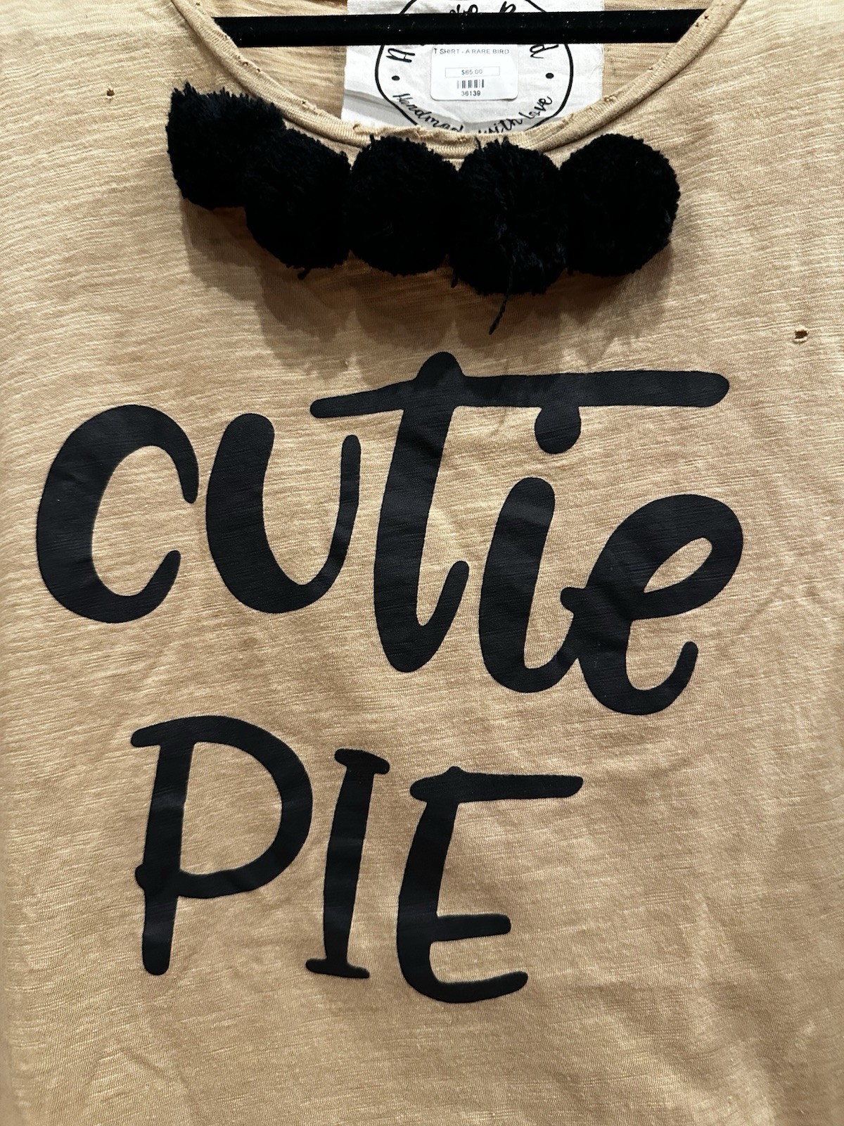 A Rare Bird “Cutie Pie” Distressed Graphic Tee with Pom Detail NWT Retail $65