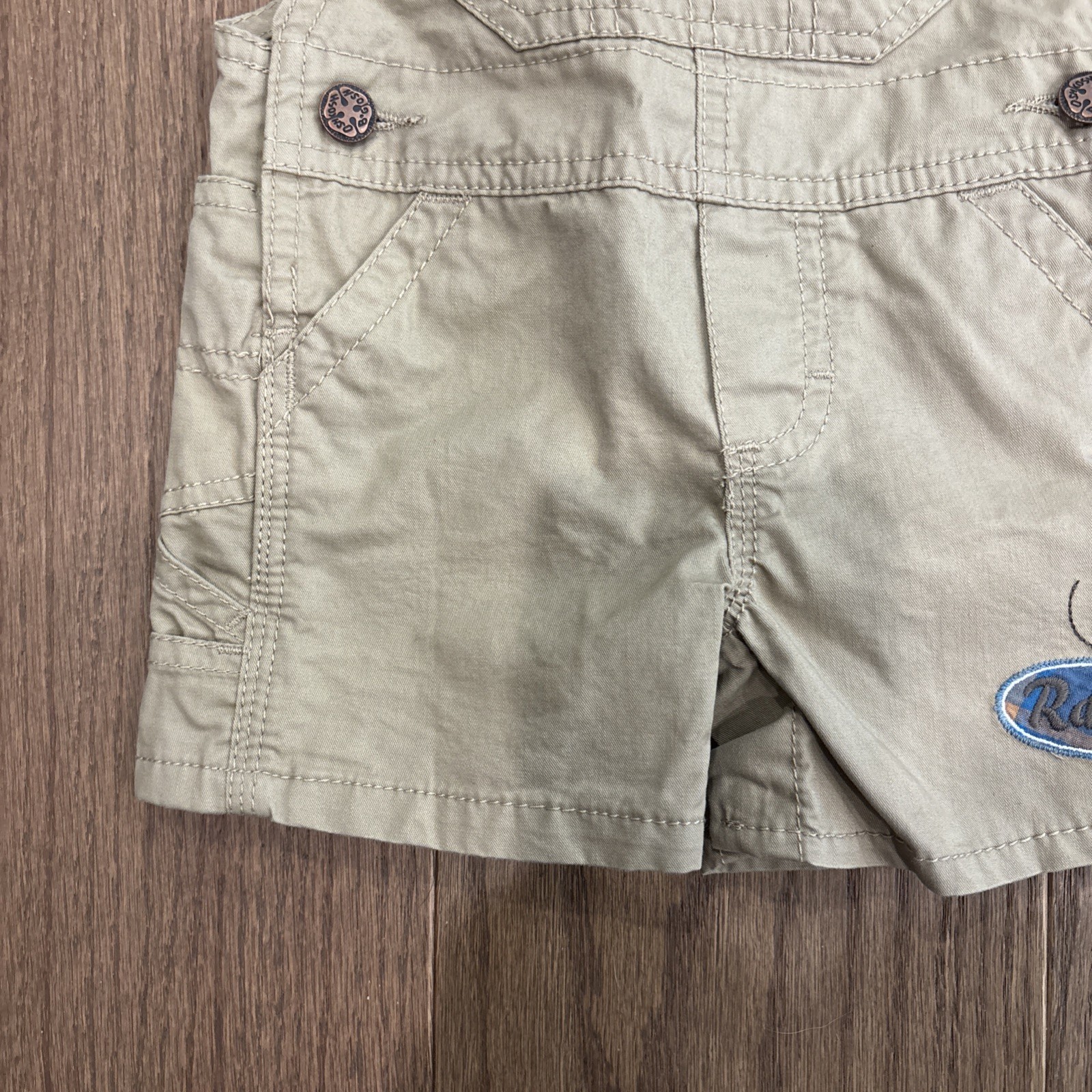 OshKosh B’Gosh Khaki Shorts Overalls W/ Highway 95 & Racer Car Size 3 Month
