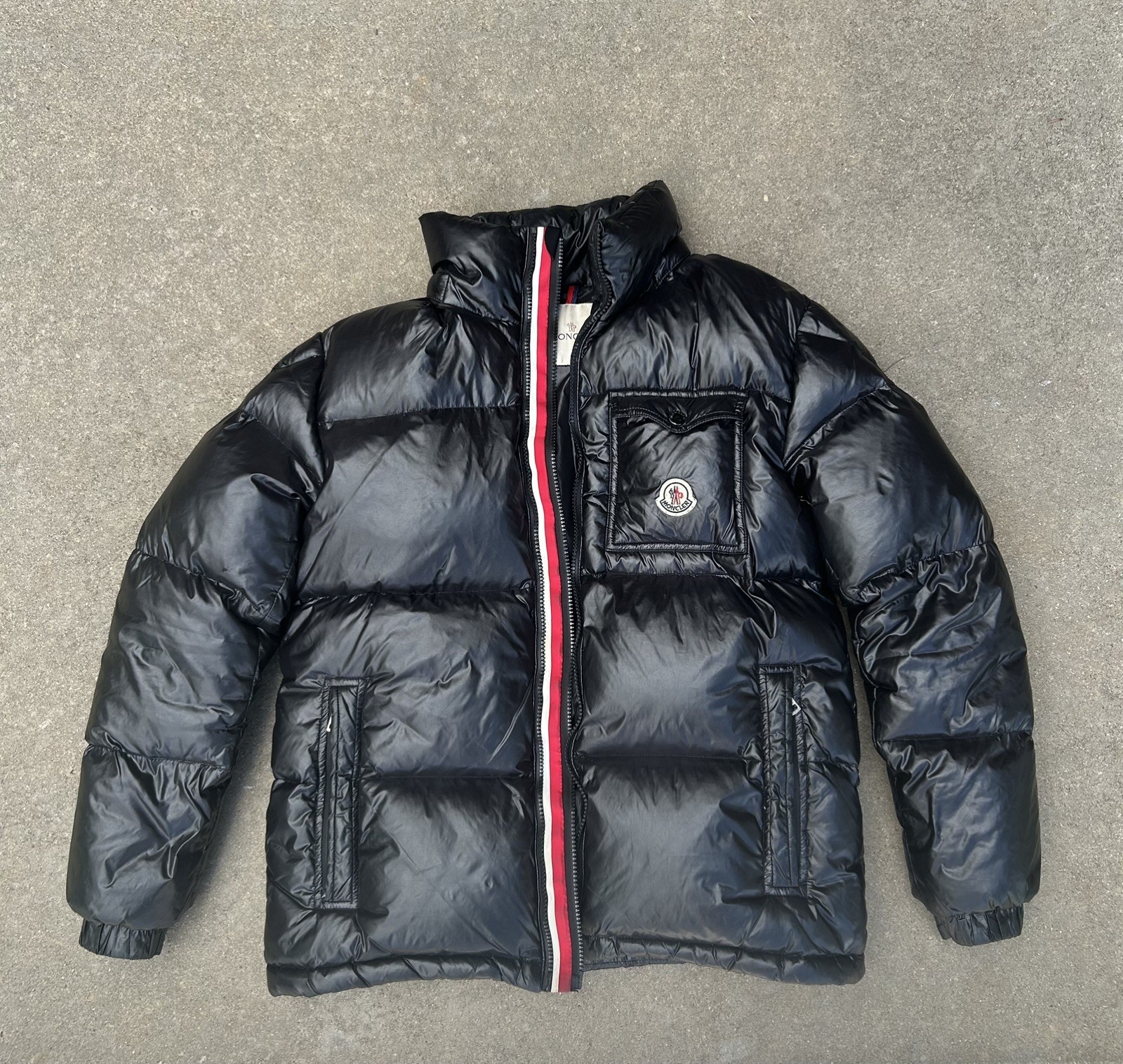 Moncler Black Insulated Zip Up Puffer Jacket with Logo & Zipper Accents