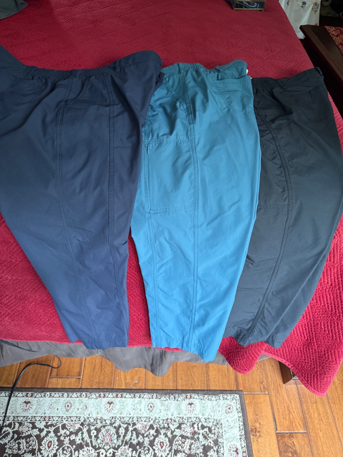 Kirkland Ladies Travel Pants. Three pair. Black, Medium blue, Navy size 12