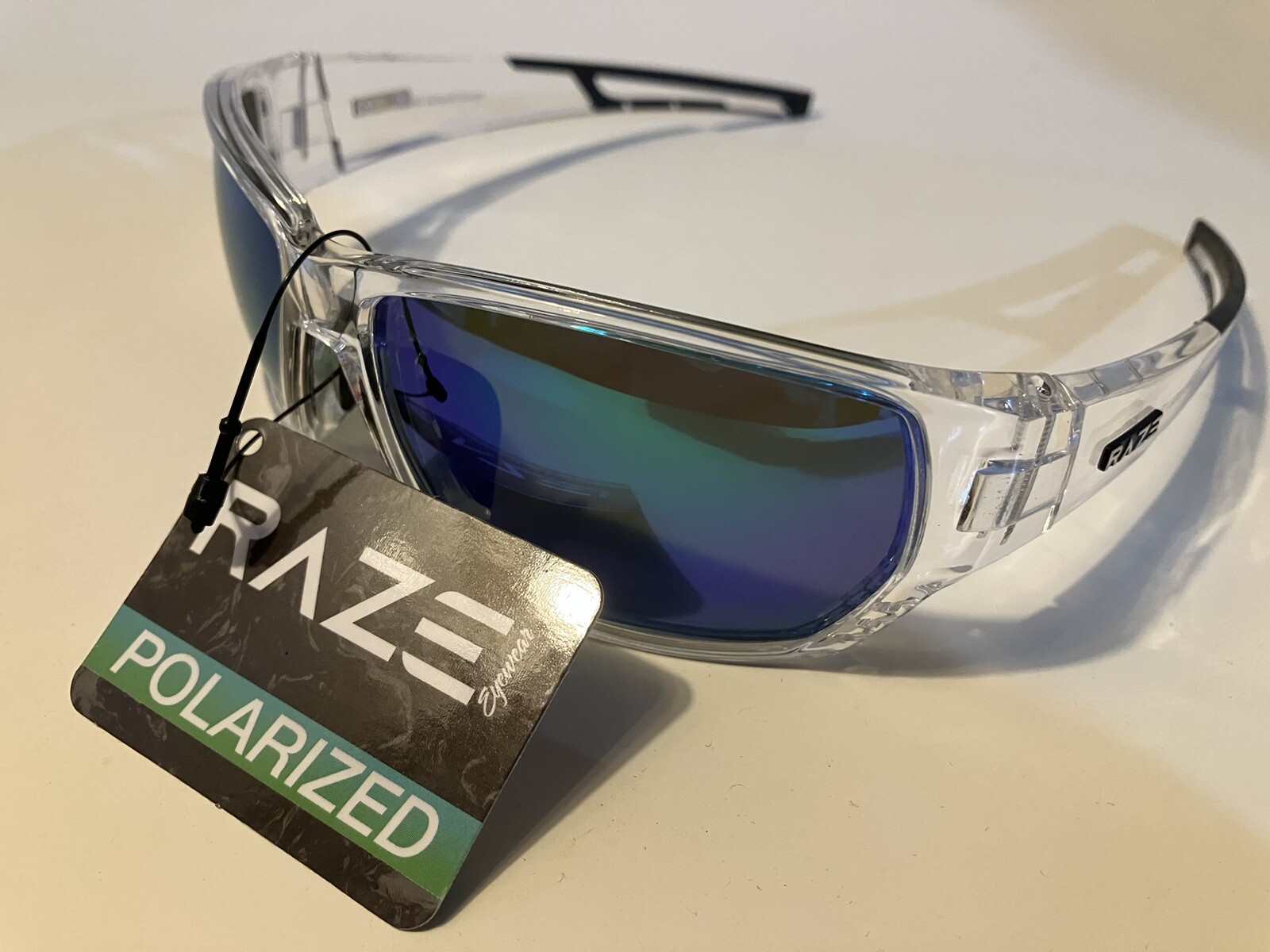 RAZE Eyewear Sunglasses Sonar Polarized Clear Frame Blue Mirror Smoke 28856