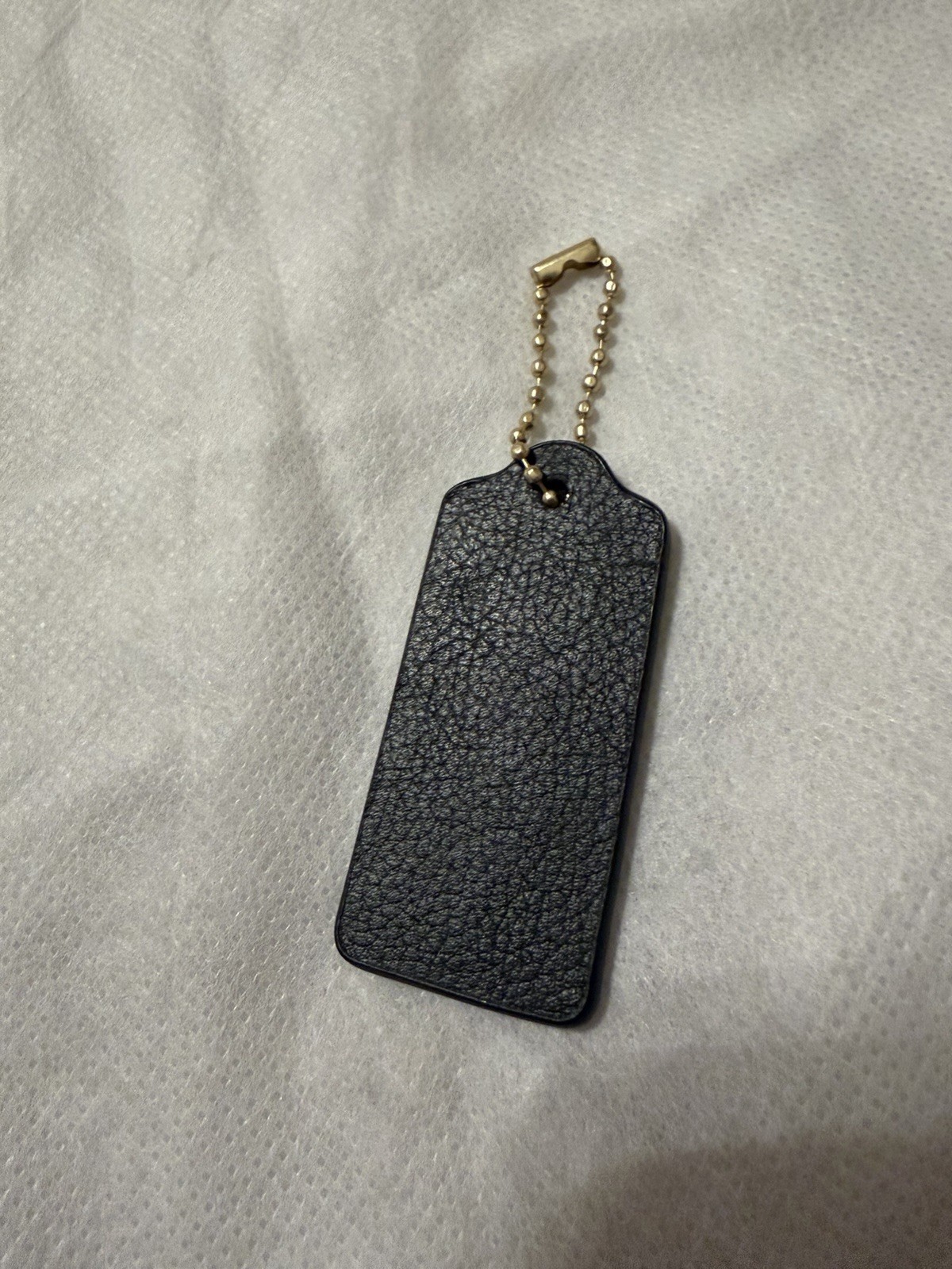 Coach Hang Tag