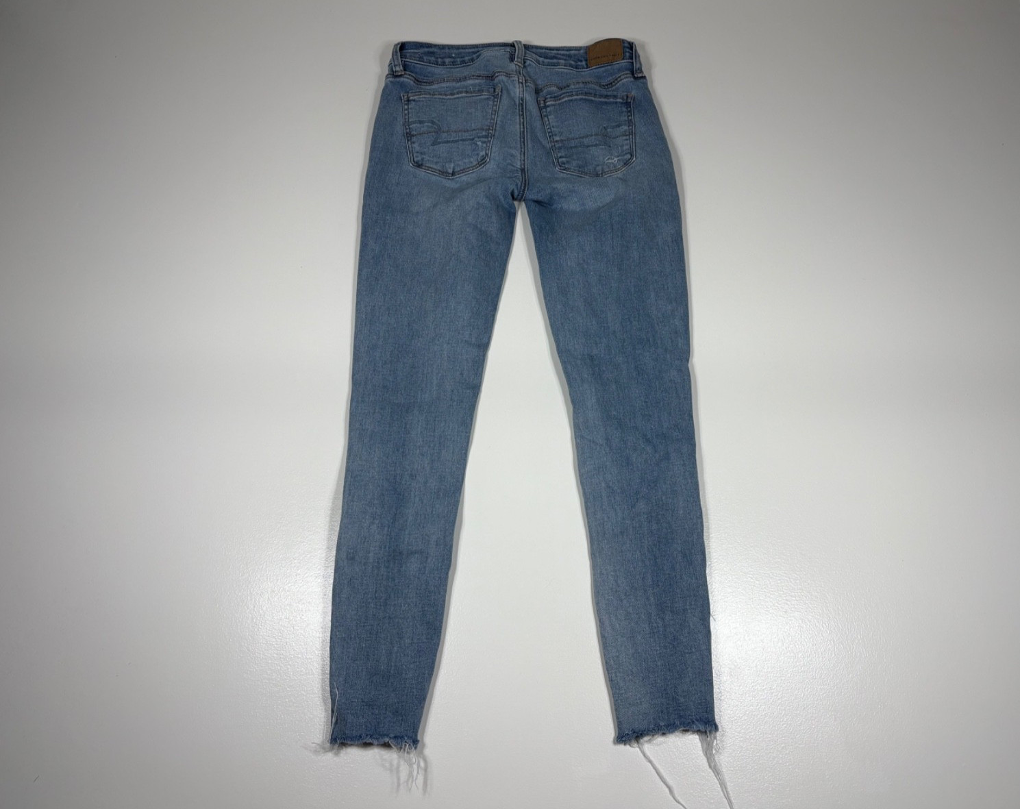 American Eagle jegging women 2 distressed skinny light wash frayed hem Tight