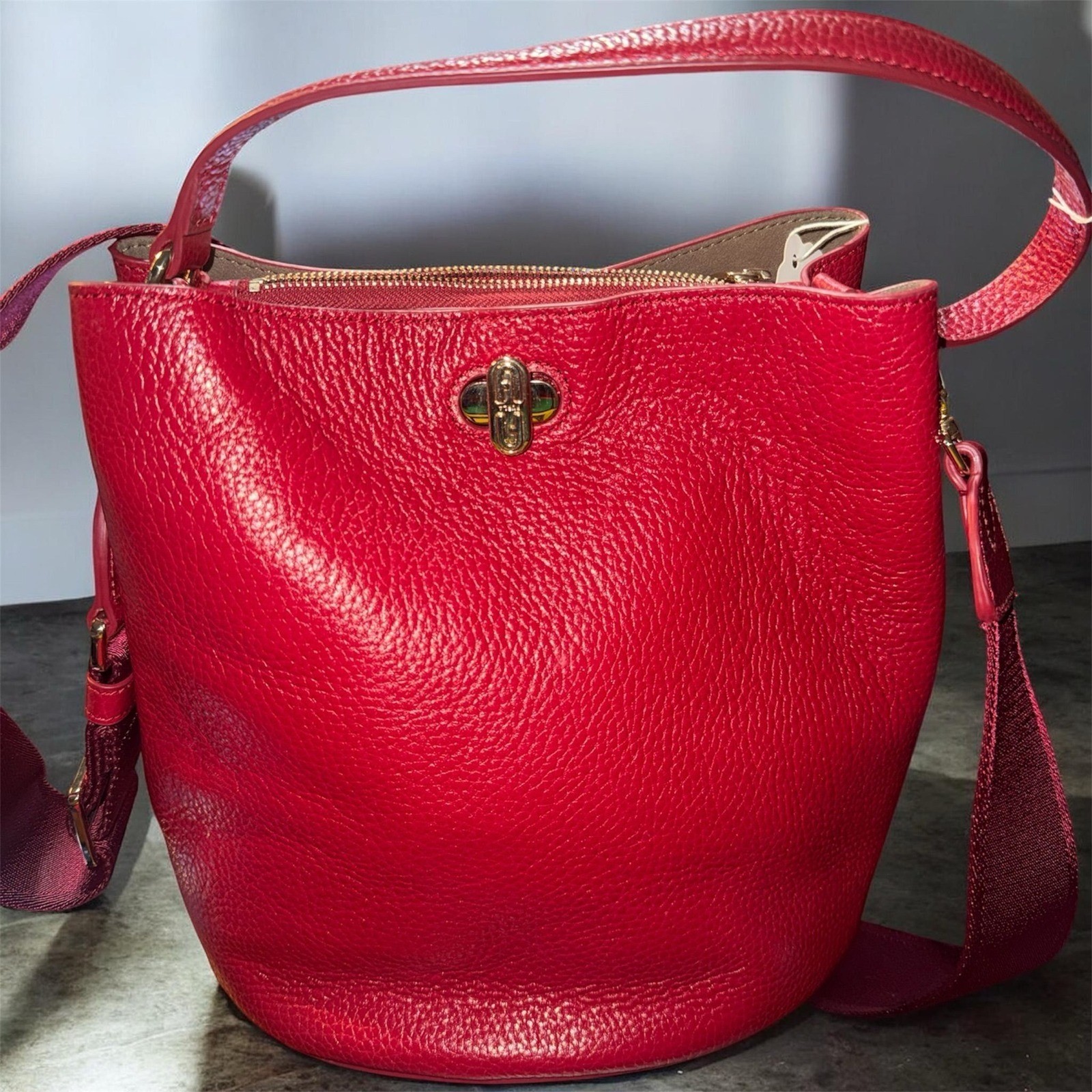Furla Red Pebbled Leather Bucket Bag Turn Lock Crossbody Web Strap Gold Hardware
