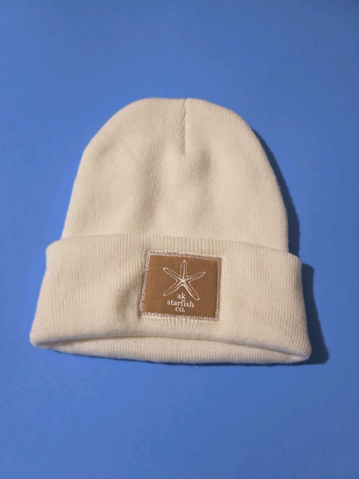 AK Starfish Co. White Patch Beanie Hat – Very Good Condition