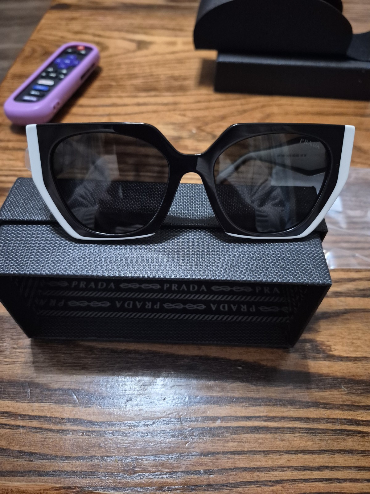 Prada PR 15WS (or SPR15W) are a popular style of oversized square sunglasses