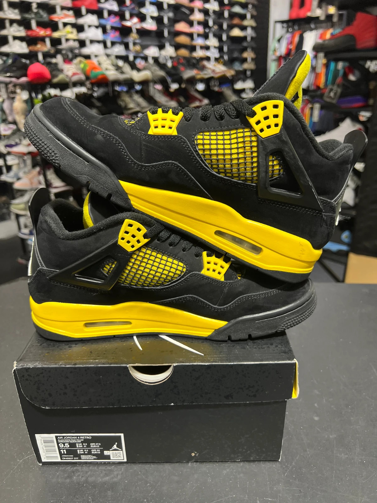 Size 9.5 – Jordan 4 Retro Mid Thunder PRE-OWNED