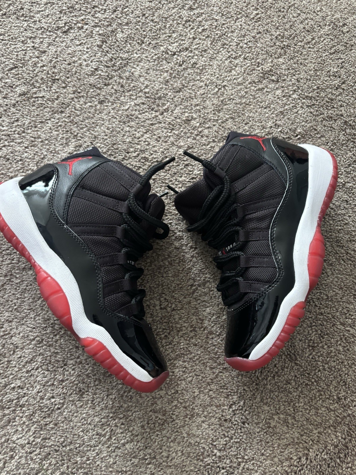 Jordan Air Jordan 11 Retro Mid Top Lace-Up Sneaker Black/Red/White 378038-061