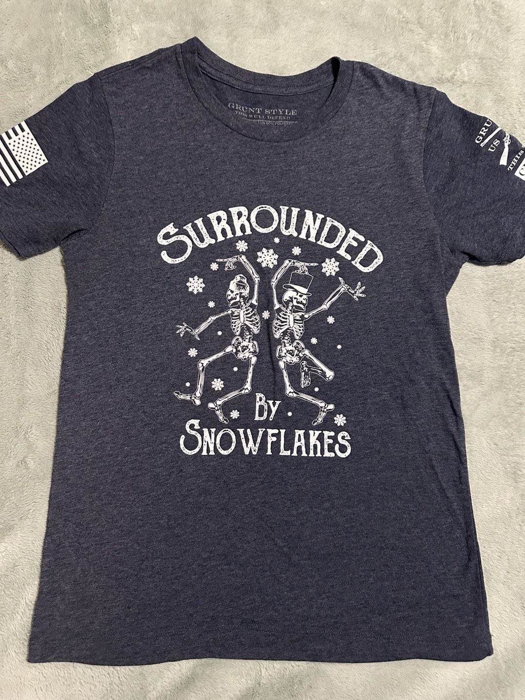 Grunt Style Surrounded By Snowflakes Skeleton Graphic T-Shirt, Size Medium