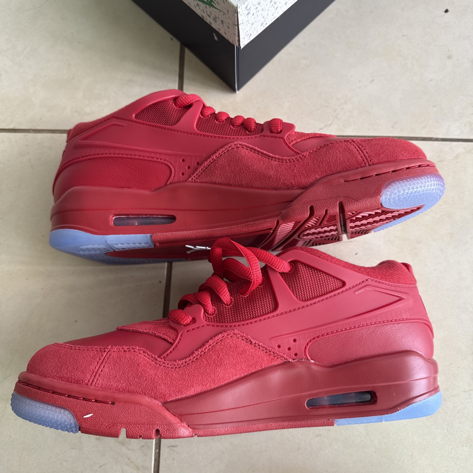 Size 9.5 – Air Jordan 4 RM Varsity Red