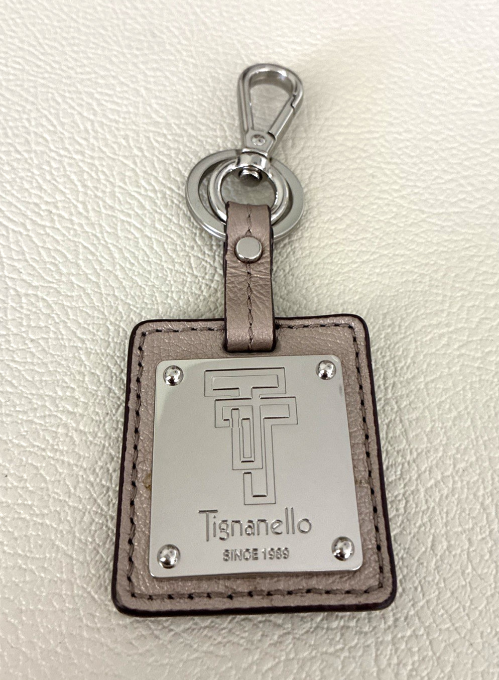 Tignanello Hang Tag Bronze Tone Faux Leather – 5 in x 2 in