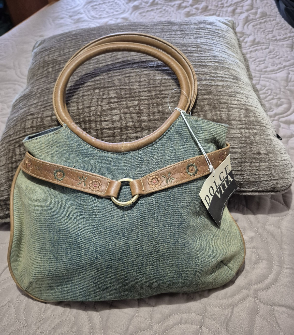 Dolce Vita light blue denim handbag with brown leather accents and floral embroi