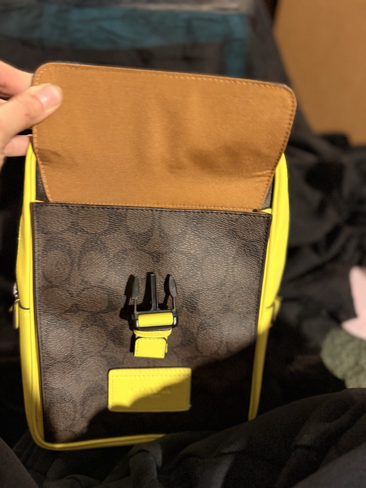 Coach Signature Medium Crossbody Zip Bag Brown Neon Black. Hangs on your back.