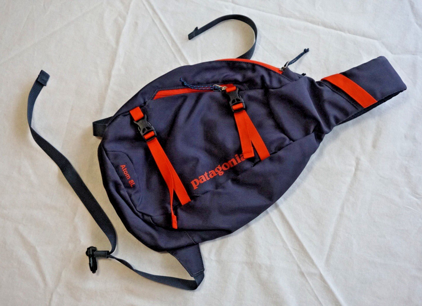 Patagonia Atom Sling 8L Backpack Crossbody Daypack Navy Orange Hiking Travel