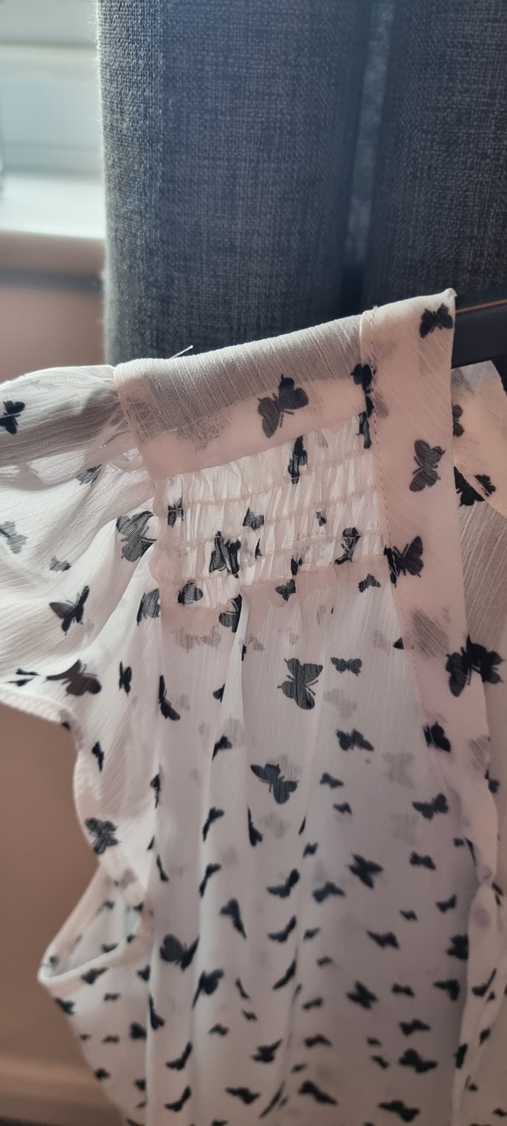 White Butterfly Print Sheer Scoop Neck Blouse with Back Tie Detailing