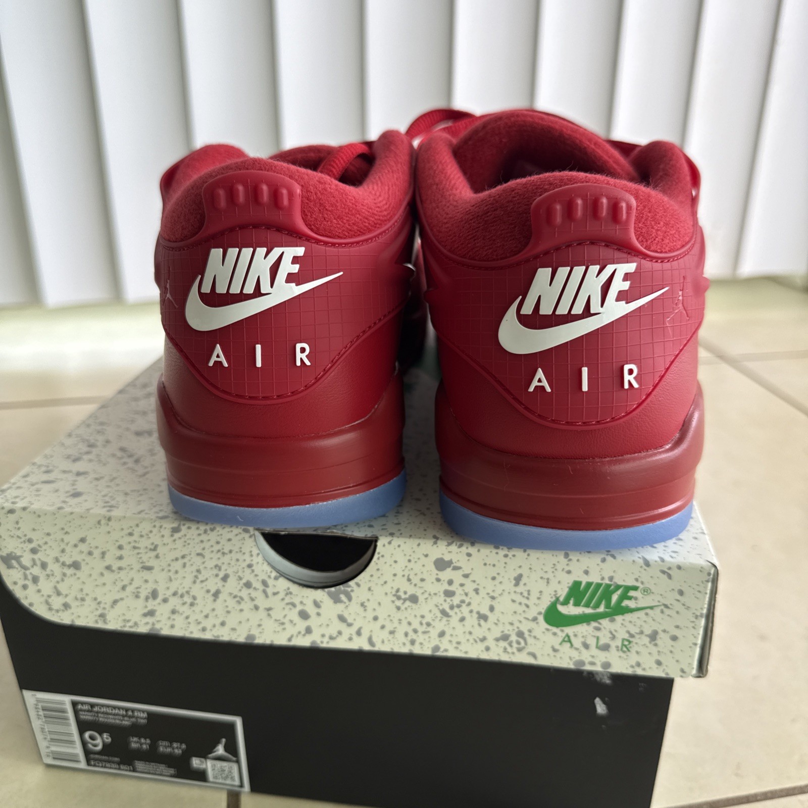 Size 9.5 – Air Jordan 4 RM Varsity Red