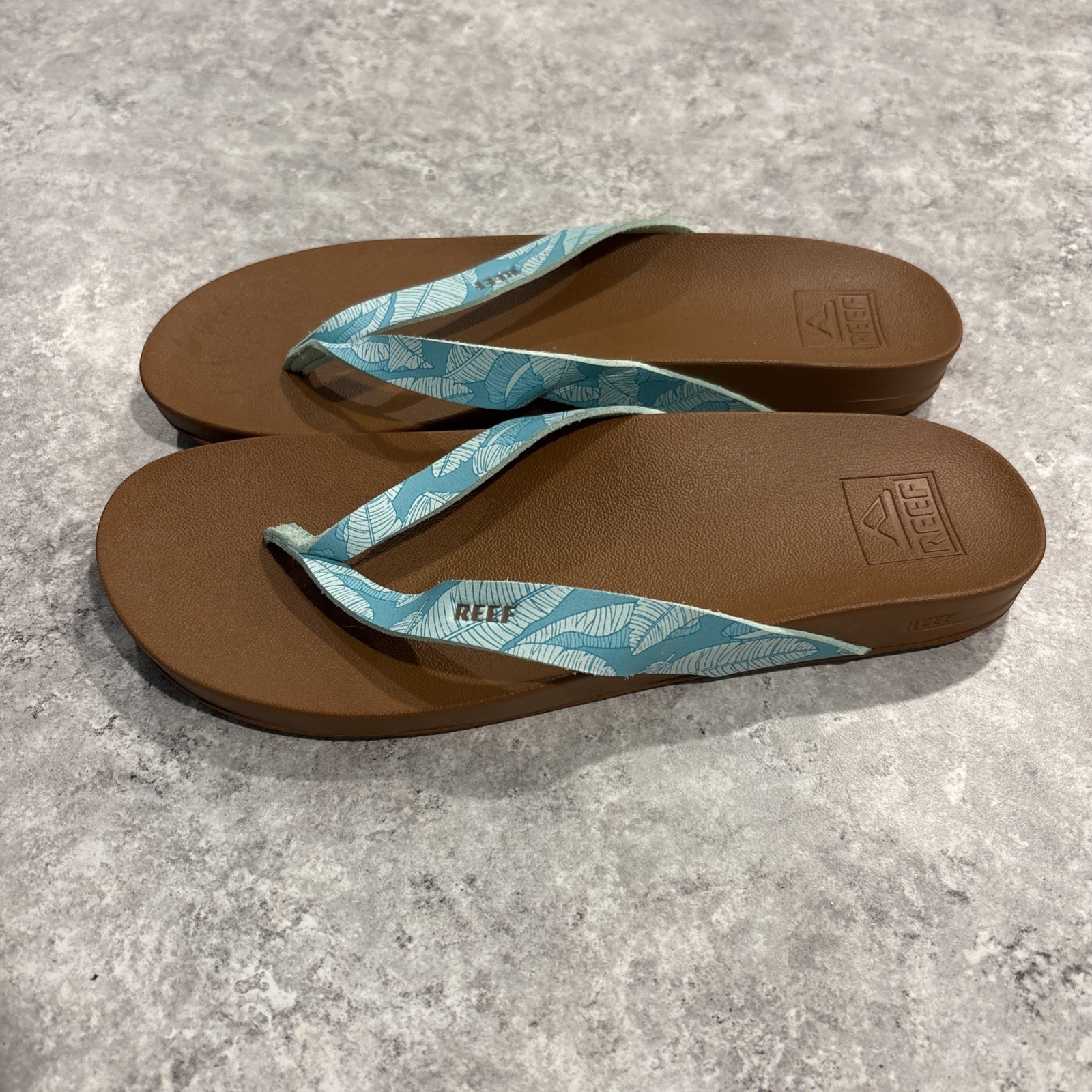 Reef Brown Flip Flops with Teal Leaf-Print Straps Cushion Court Size 9.5 W