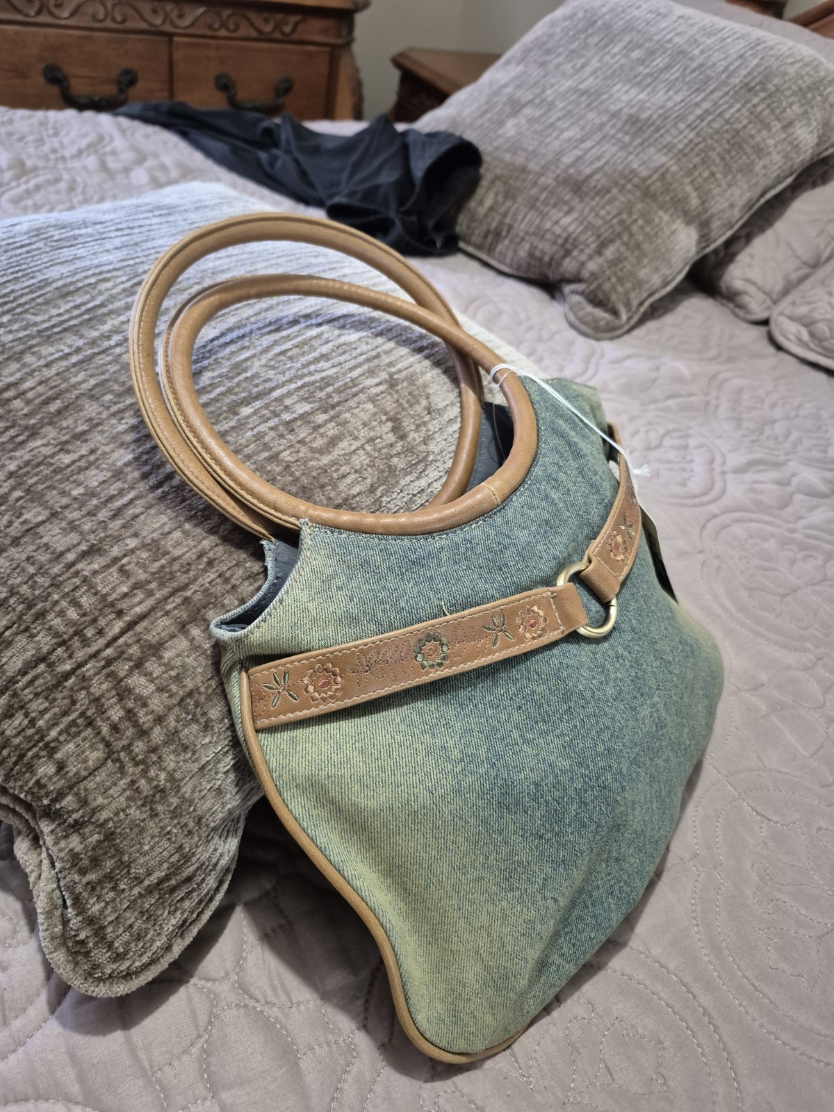 Dolce Vita light blue denim handbag with brown leather accents and floral embroi