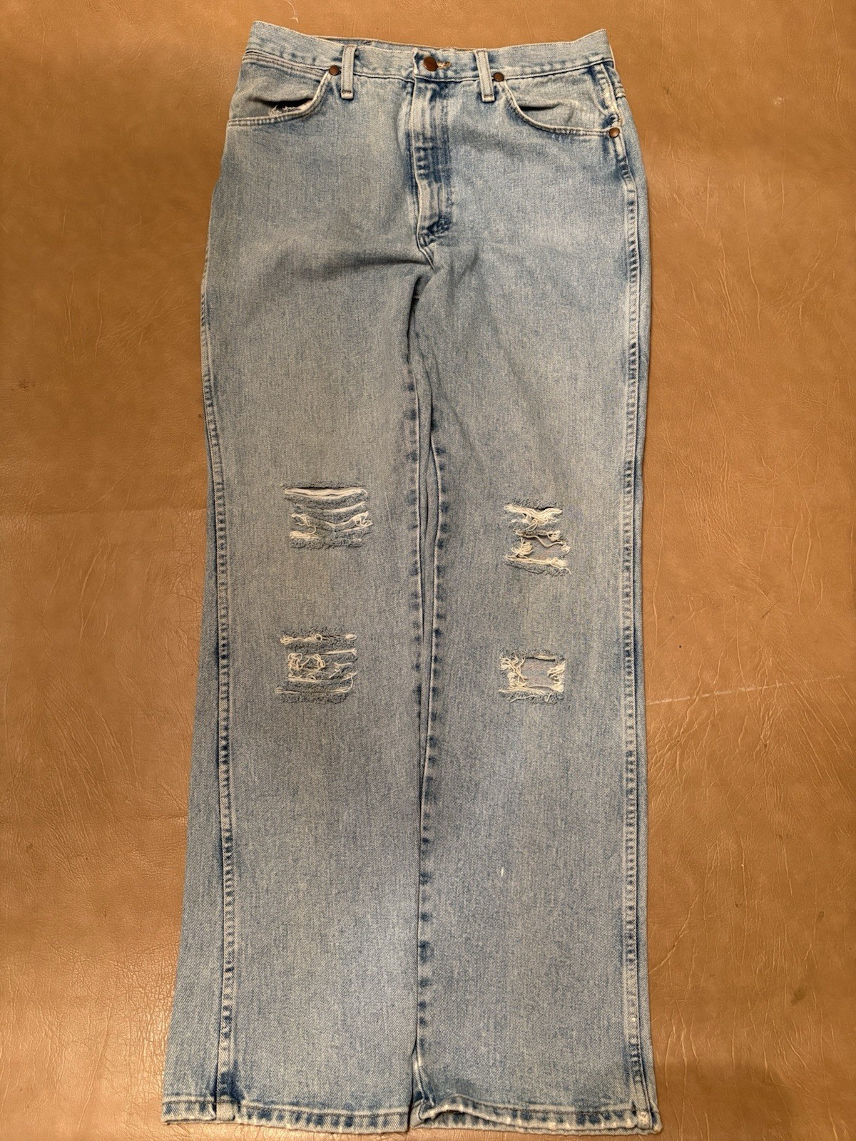 Wrangler Men’s Regular Fit Straight Blue Light Wash Distressed Denim Jeans