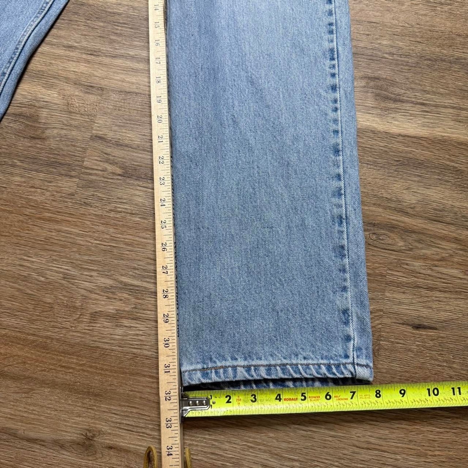 Vintage 90’s Levi’s paper tag light wash style 550 denim jeans Size 34×32