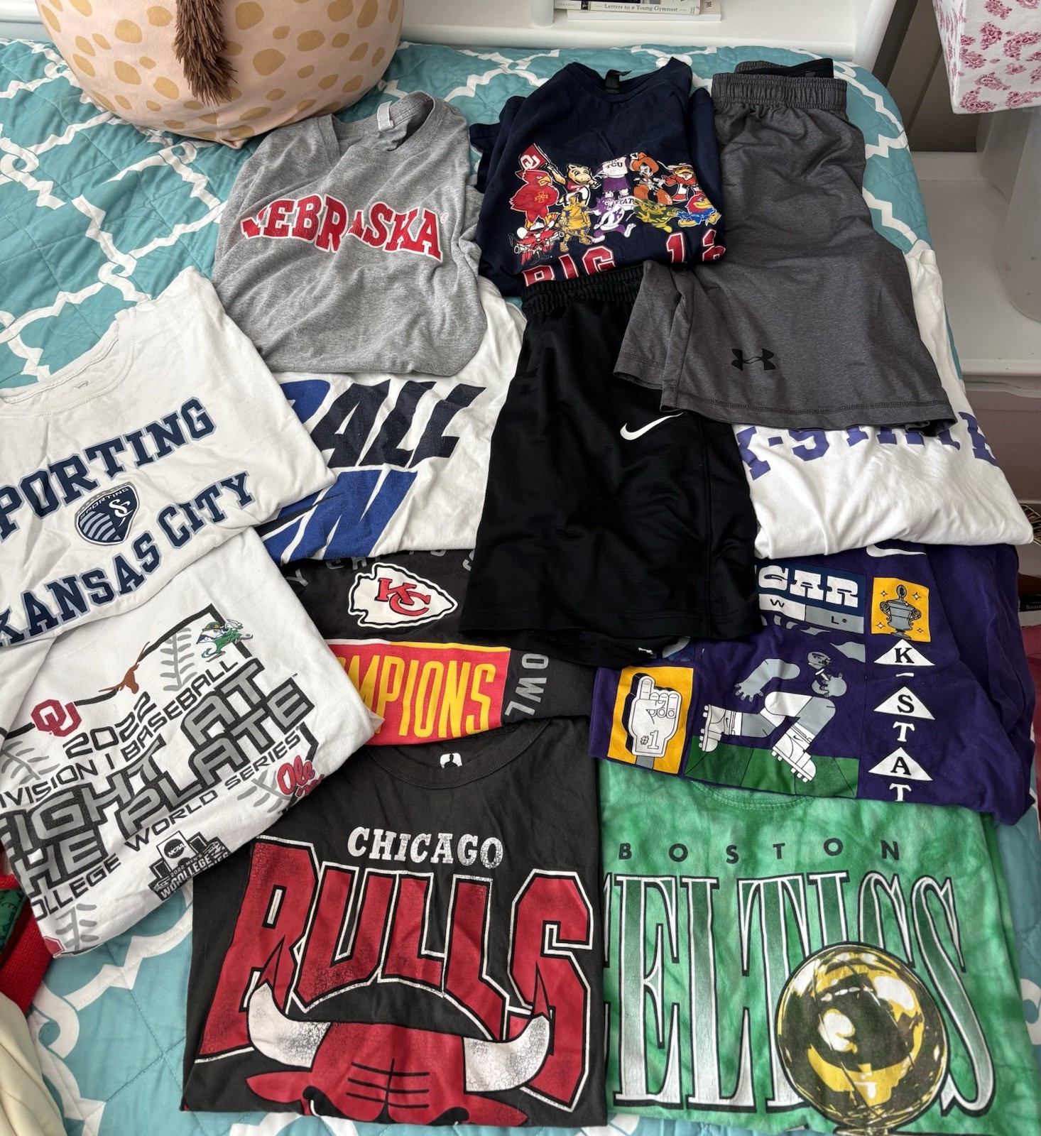 Lot of Sport Clothing. Sizes Vary. Most Shirts are Large and Shorts a S. Nike