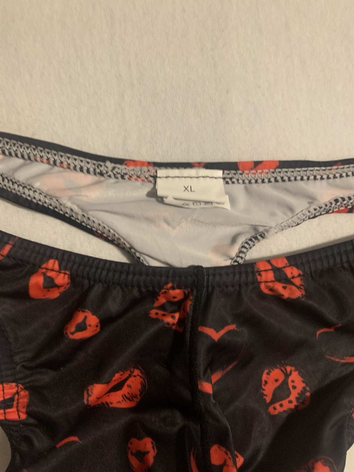 Mens Kiss Pattern Black Thong. Size XL (See Details)