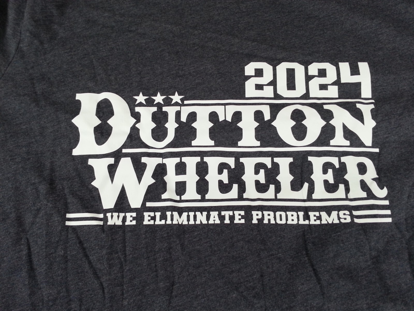 2024 Dutton Wheeler We Eliminate Problems Election Size L Grey Women’s T-Shirt