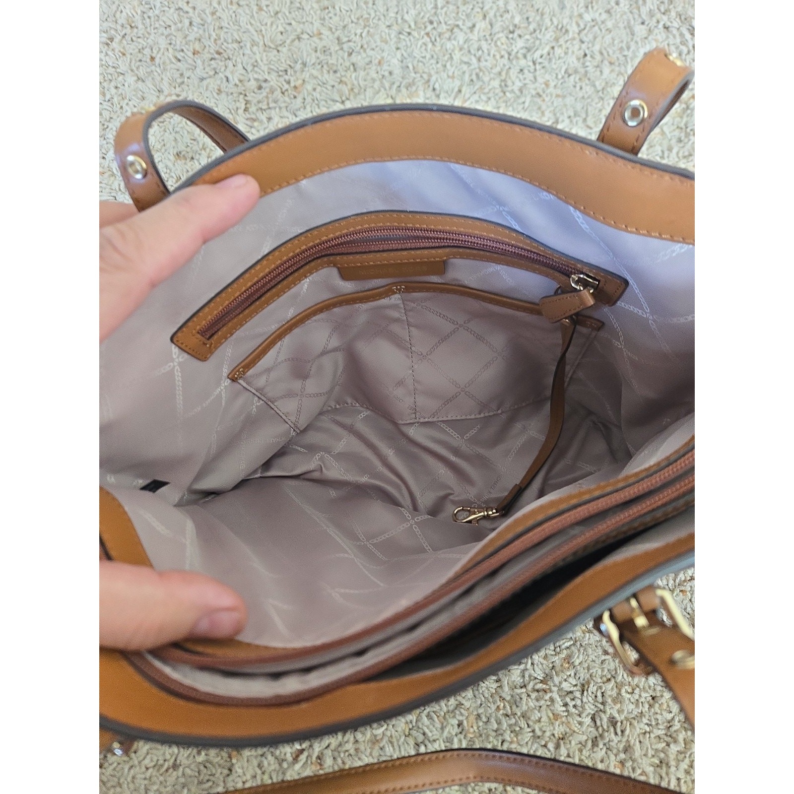 MICHAEL KORS VOYAGER EAST WEST LOGO SIGNATURE TOTE BAG Brown