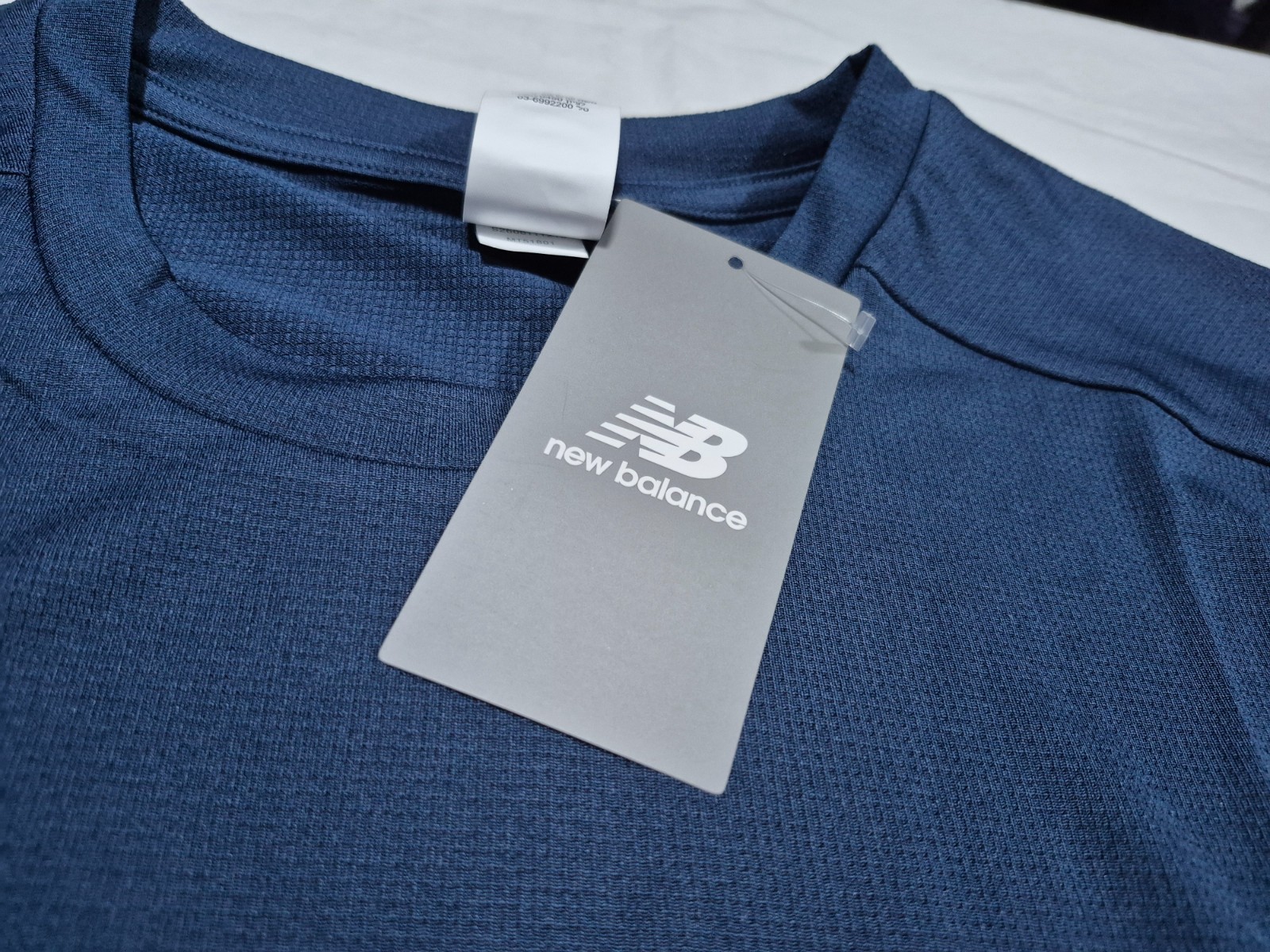 New Balance Men’s Fast Drying -Moisture Wicking Running Sports shirt Polyester