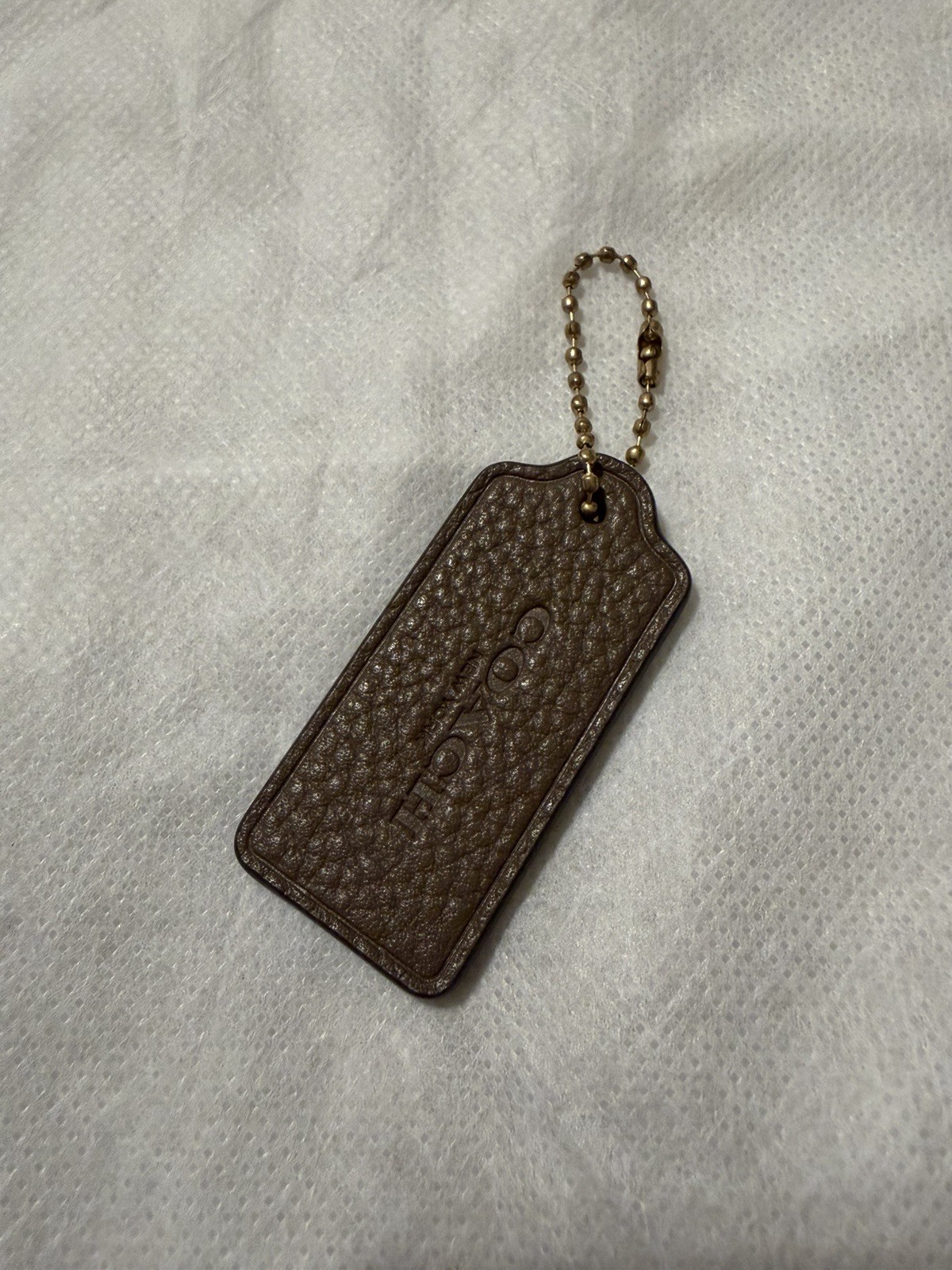 Coach Hang Tag