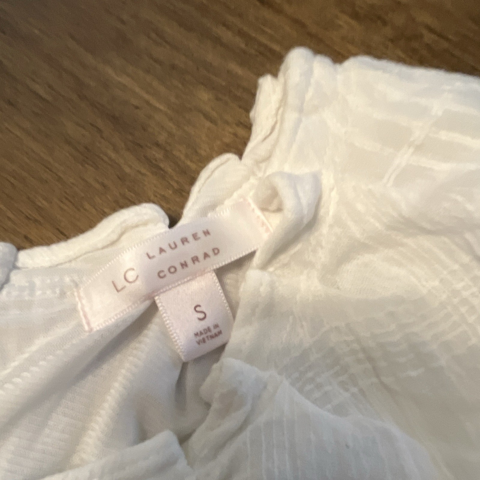 LC Lauren Conrad White Solid Sleeveless V-Neck Tie Front Bow Ruffle Blouse S