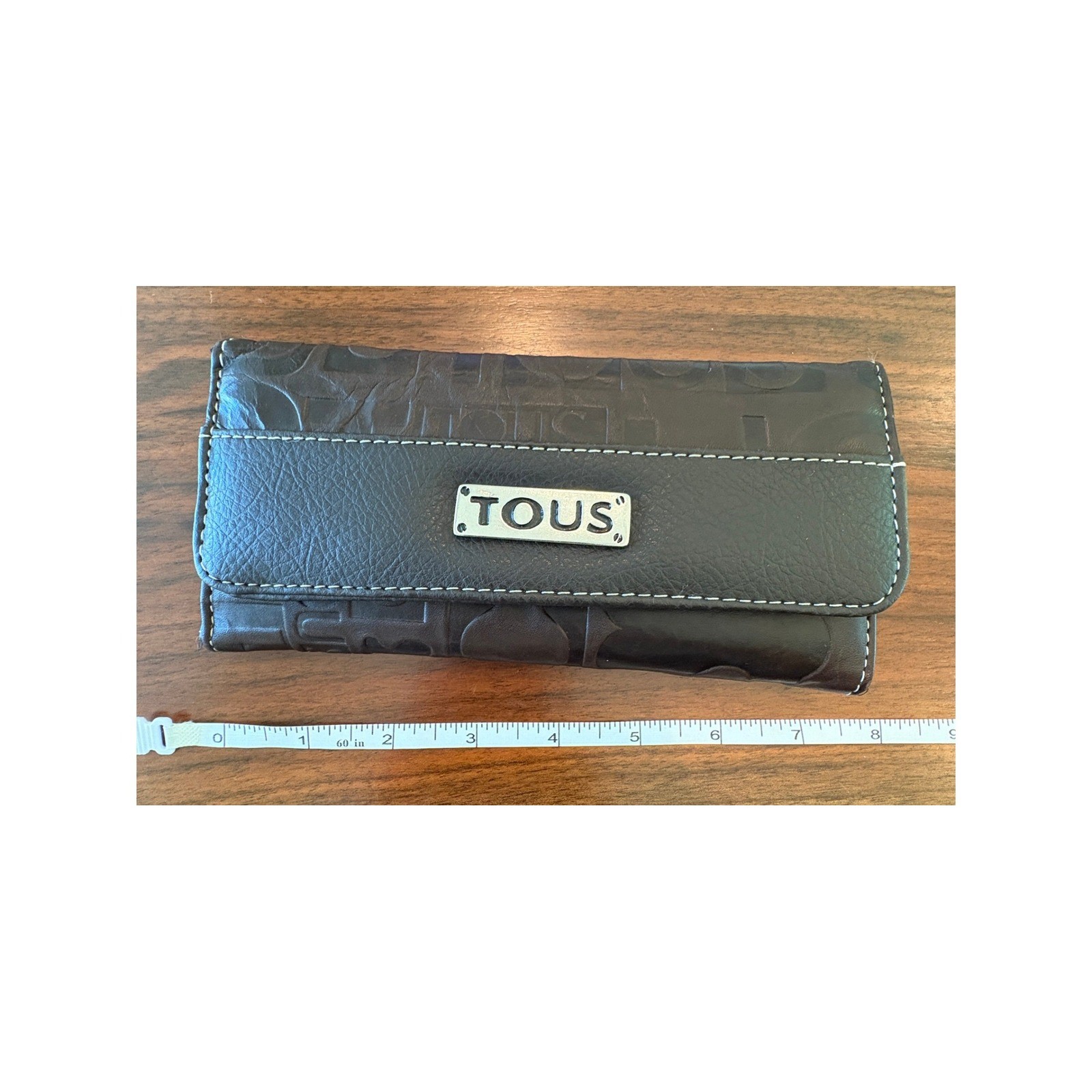 Tous Dark Brown Embossed Leather Trifold Wallet White Stitching Logo Plaque